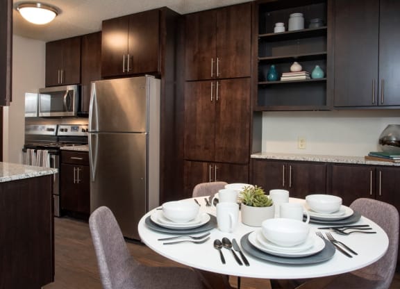 Extended kitchen cabinetry at Aspenwoods Apartments, Eagan, MN