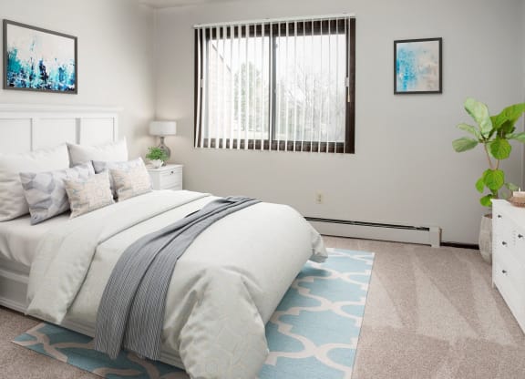 Comfortable Bedroom With Large Window at Aspenwood Apartments, Eagan, MN