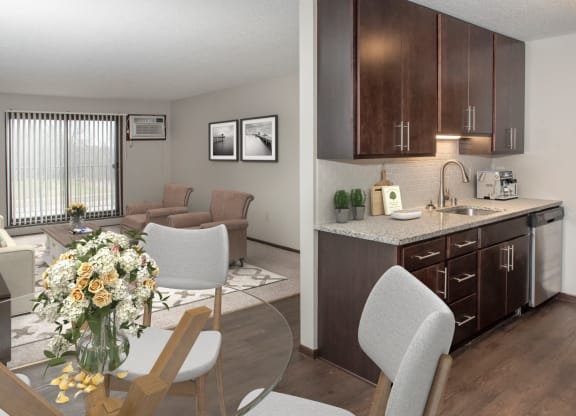 Living Room View From Kitchen at Aspenwood Apartments, MN, 55123