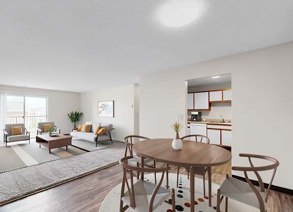 A living room with a brown table and chairs.