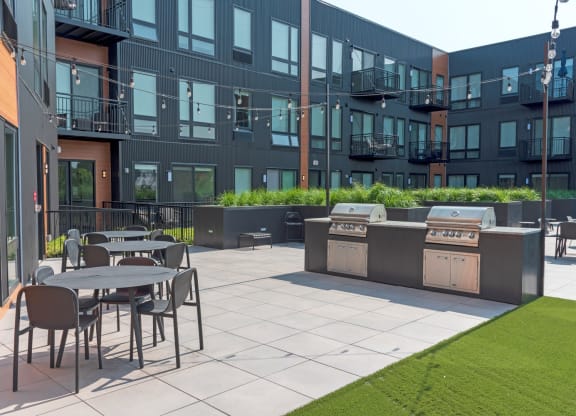 Outdoor Grill With Intimate Seating Area at CityLine Apartments, Minnesota, 55406