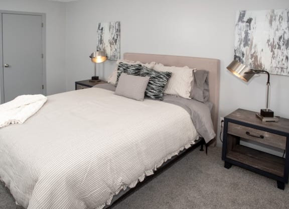 Bedroom 2 with bedroom set, night stands and walk in closet