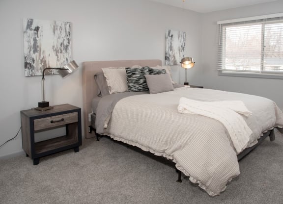 bedroom 2, bed set with night stand and large window