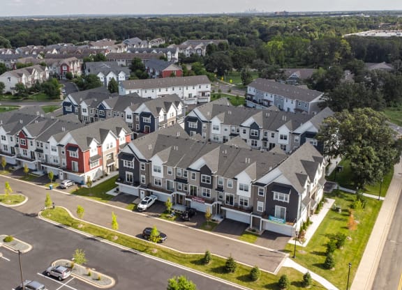 an aerial view of an apartment complex in a suburb