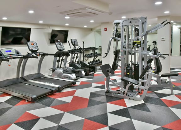 Fitness center With Equipment at Eagan Place Apartments, Eagan, MN