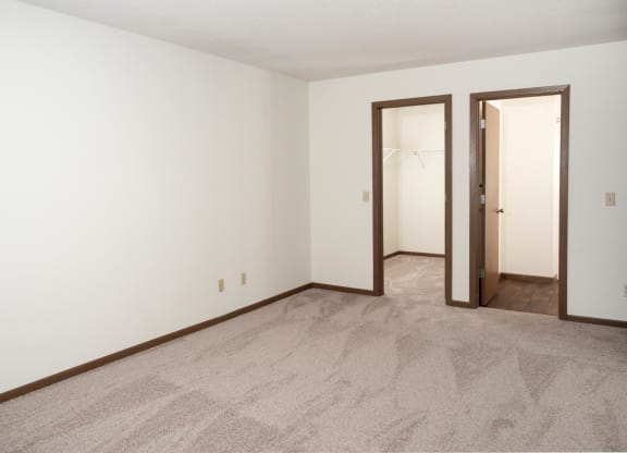 Bedroom with walk in closet
