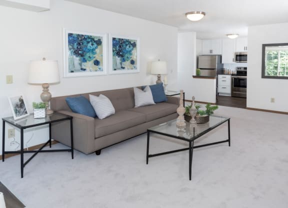 a living room with a couch and a coffee table