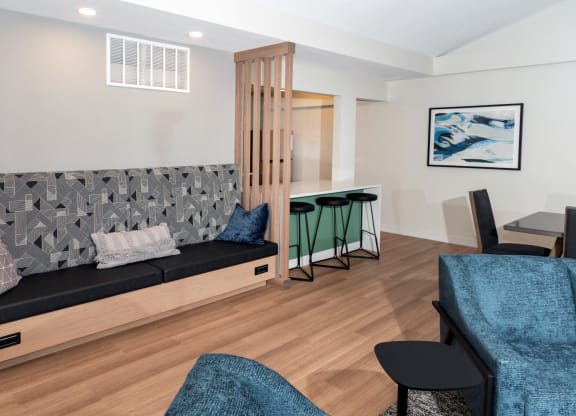 a living room with a couch and a table