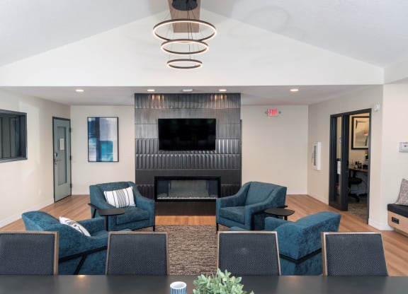 a living room filled with furniture and a fire place
