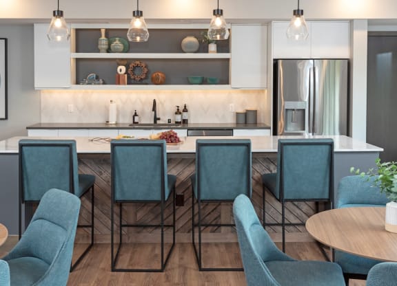 Fitted Kitchen With Island Dining at Grove80 Apartments, Cottage Grove, Minnesota