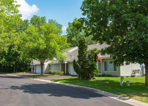 a street in front of a row of houses
