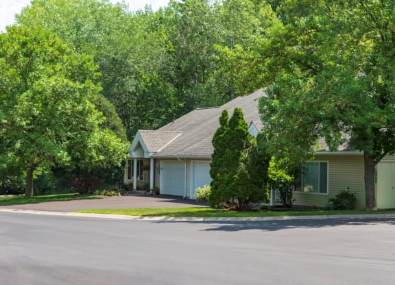 a house with trees in the background