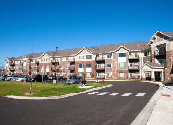 Large Blacktop Parking Lot in Front of Carver Crossing Apartments