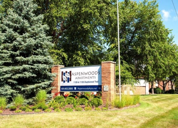 Welcoming Sign at Aspenwoods Apartments in Eagan