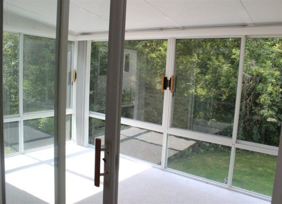 a room that has a bunch of windows in it