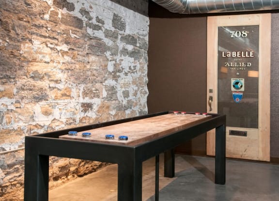 Shuffle Board Table in Club Room at 700 Central Apartments in Minneapolis, MN