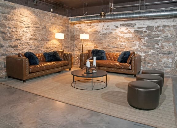 Large Brown Sofas Around Circle Table in Club Room at 700 Central Apartments, Minnesota, 55414
