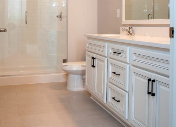 Bathrooms with Glass-Enclosed Showers at Residences at 1700, Minnetonka, MN