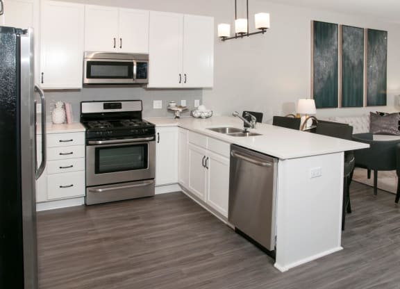 Kitchen with Over-the-Range Microwaves at Residences at 1700, Minnesota