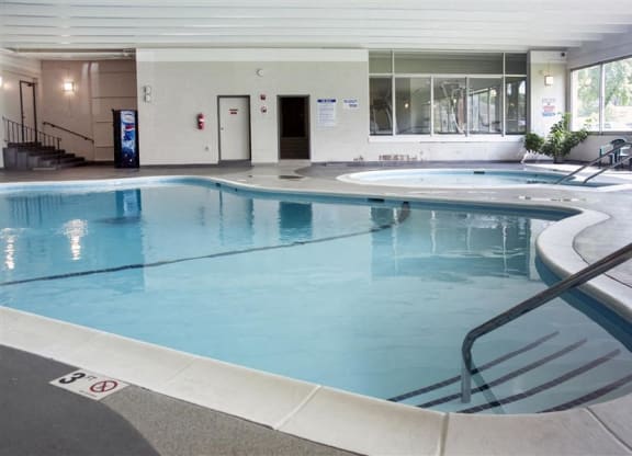 a large swimming pool in a hotel room