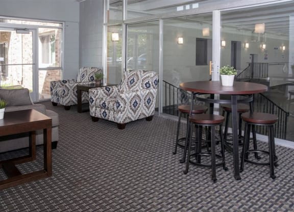 a community room with a table and some chairs