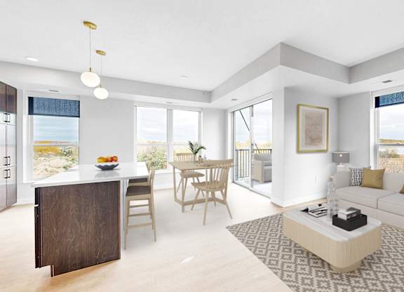 A modern living room with a dining area and a kitchen in the background.