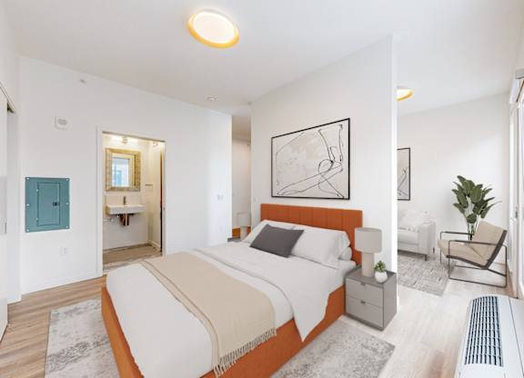 A bedroom with a large bed and a painting on the wall.
