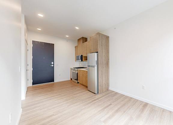 Wooden floor in all rooms at One West Drive Apartments, Excelsior
