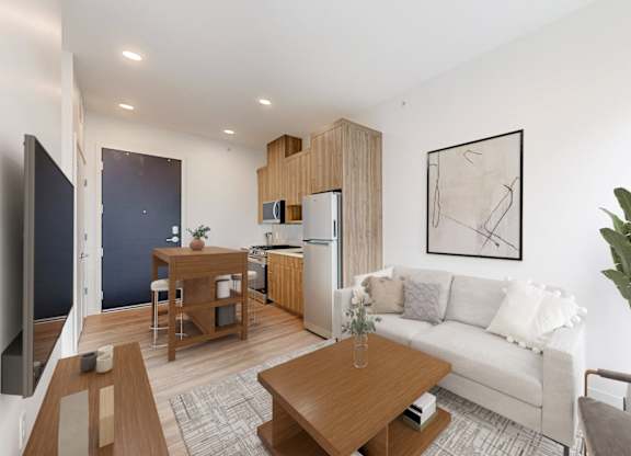A modern living room with a white sofa and a wooden coffee table.