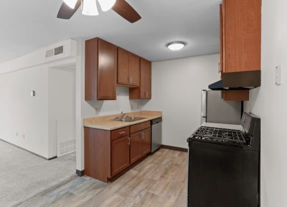 a kitchen and living room in a 555 waverly unit