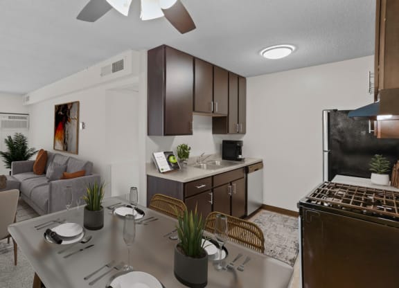 a kitchen and dining area in a 555 waverly unit