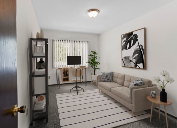 a living room with a couch and a tv