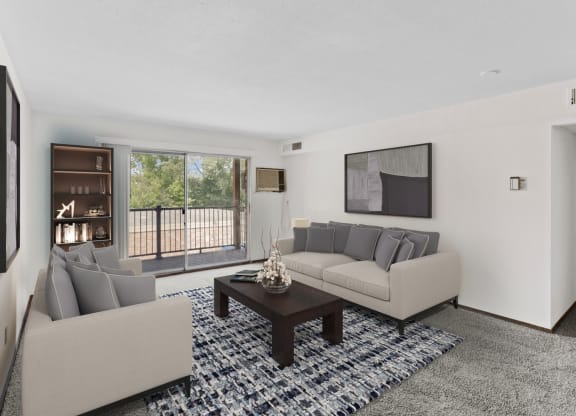 a living room with couches and a coffee table