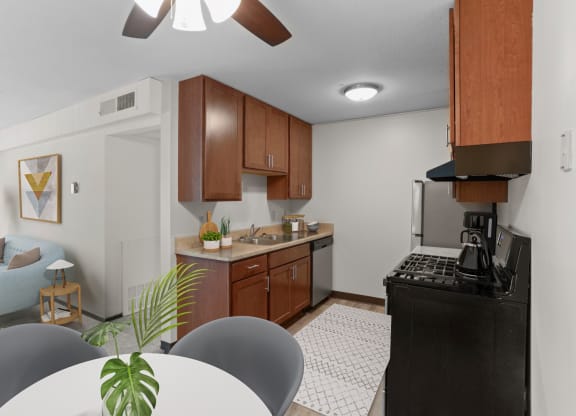 a kitchen and dining area in a 555 waverly unit
