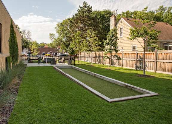 outdoor patio with bocce ball court