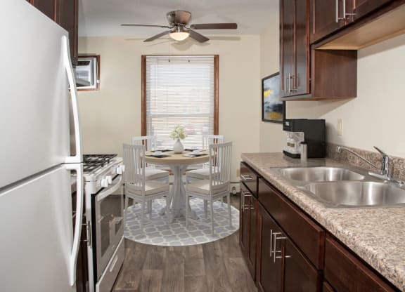 a kitchen and dining area at Point of America Apartments,Minnesota