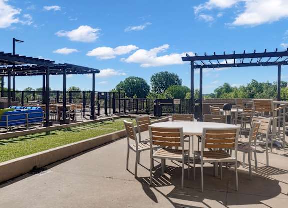 A sunny day at the outdoor seating area of a restaurant.