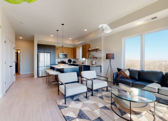 Living Room With Kitchen at The Exchange Apartments, New Brighton, MN