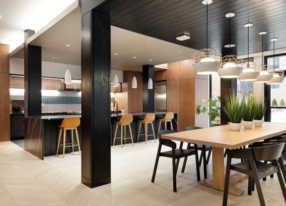 Community room with kitchen at The Hill Apartments, Saint Paul, 55102