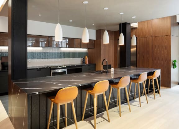 community room island seating at The Hill Apartments, Minnesota