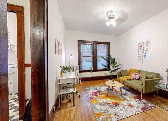a living room with a couch and a table