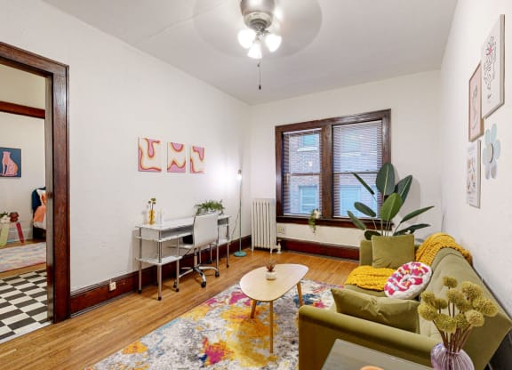a living room with a couch and a table