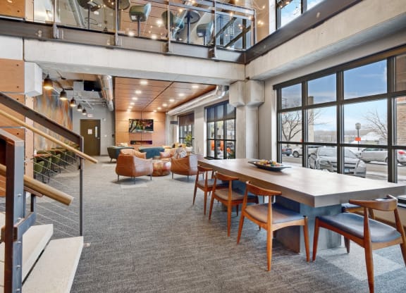 a large open room with a large table and chairs at The Yards and Backyards, Minnesota
