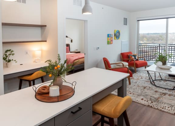 a kitchen and living room in an apartment at Tyler Street Stacks, Minnesota