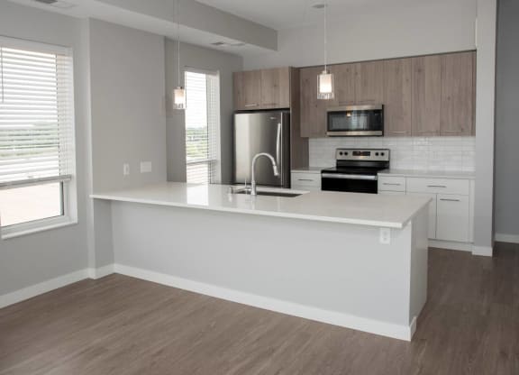 1 bedroom joel kitchen with breakfast bar at Urban Park I and II Apartments, St Louis Park, MN, 55426