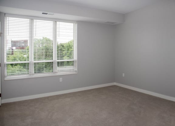 Marc floor plan bedroom with large windows at Urban Park I and II Apartments, Minnesota, 55426