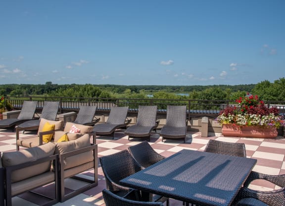 Rooftop patio with a variety of lounge seating at Victoria Flats, MN 55386