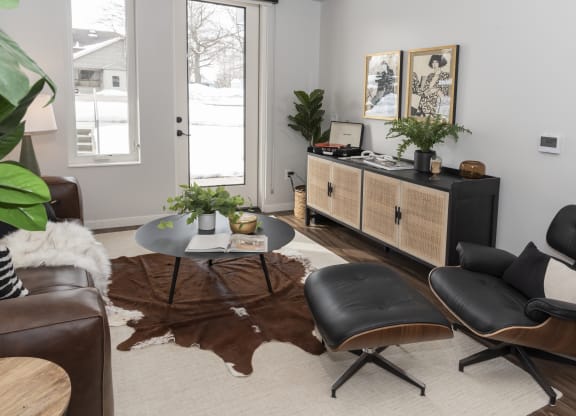 a living room with a couch and a chair