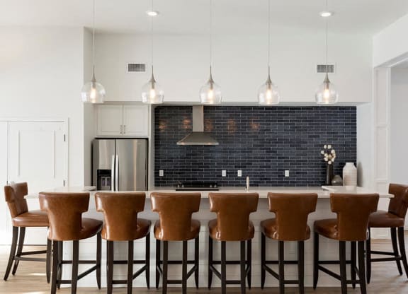Stunning navy backsplash in clubroom kitchen at Waterstone Place in Minnetonka