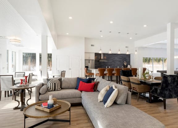 Large furnished clubroom with hardwood floors at Waterstone Place in MN 55305